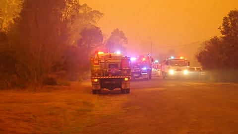 Orange sky keeps firefighters on alert in southern Australia