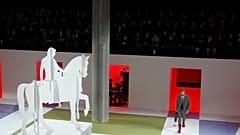 A model wears a creation as part of the Prada men's Fall-Winter 2020/21 