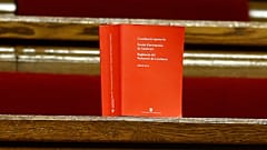 A book of the Spanish constitution is placed on the benches of opposition Catalan lawmakers inside the Catalan parliament in Barcelona, Spain, Friday, Oct. 27, 2017