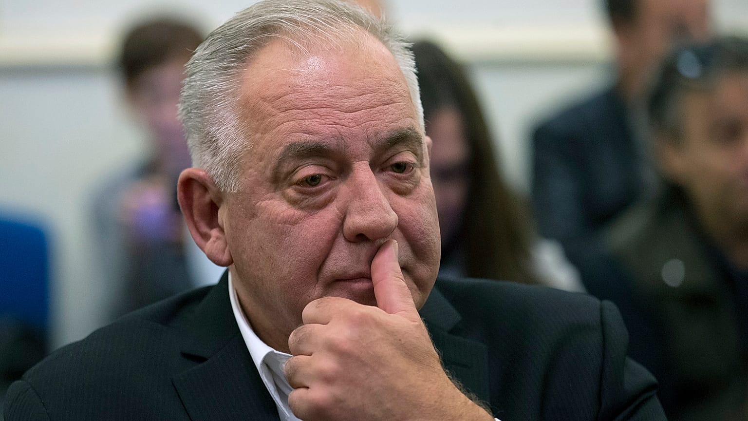 Croatia's former prime minister Ivo Sanader sits in the courtroom prior to the reading of his verdict, in Zagreb, Croatia, Monday, Oct. 22, 2018