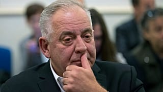 Croatia's former prime minister Ivo Sanader sits in the courtroom prior to the reading of his verdict, in Zagreb, Croatia, Monday, Oct. 22, 2018