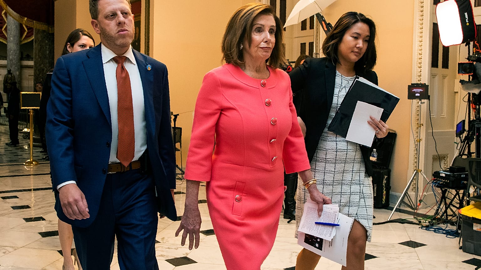 House Speaker Nancy Pelosi of Calif., centre, walks towards the House Chamber on Capitol Hill, Wednesday, Jan. 15, 2020, in Washington.