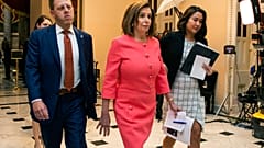 House Speaker Nancy Pelosi of Calif., centre, walks towards the House Chamber on Capitol Hill, Wednesday, Jan. 15, 2020, in Washington.