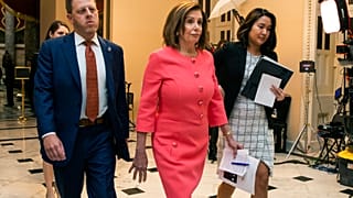 House Speaker Nancy Pelosi of Calif., centre, walks towards the House Chamber on Capitol Hill, Wednesday, Jan. 15, 2020, in Washington.