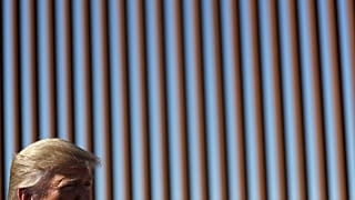 President Donald Trump talks with reporters as he tours a section of the southern border wall, Wednesday, Sept. 18, 2019, in Otay Mesa, California