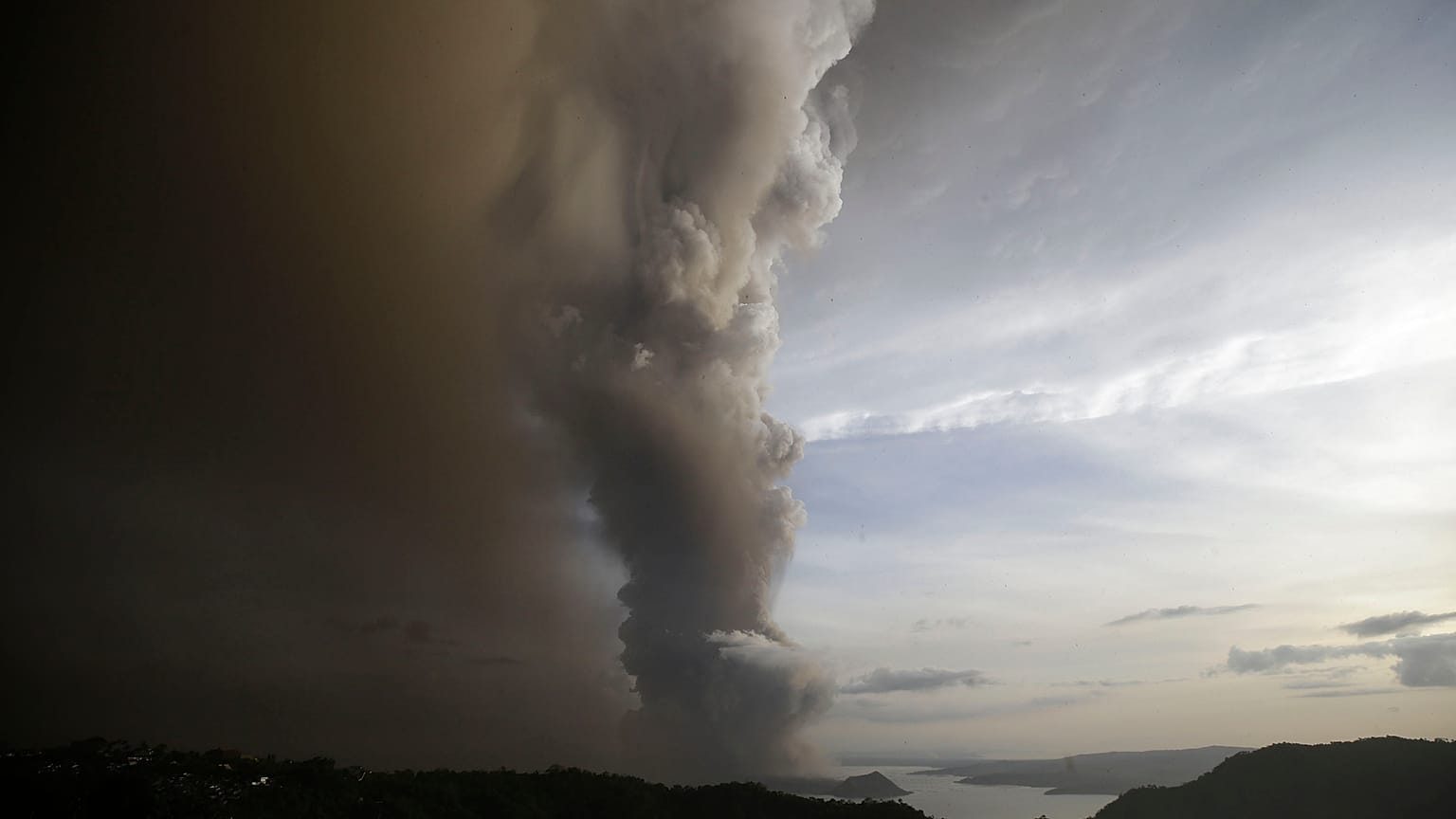 Taal Volcano spews ash as it erupts Sunday Jan. 12, 2020, in Tagayta.