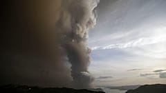 Taal Volcano spews ash as it erupts Sunday Jan. 12, 2020, in Tagayta.