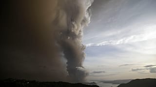 Taal Volcano spews ash as it erupts Sunday Jan. 12, 2020, in Tagayta.