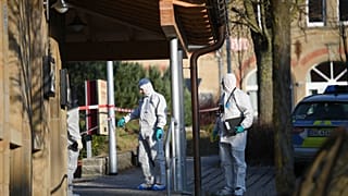 Police at the scene after shots were fired in Rot Am See, Germany, Friday, Jan. 24, 2020.