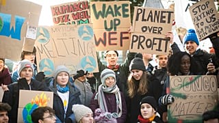 Youth climate strikers at Davos with Greta Thunberg (centre).