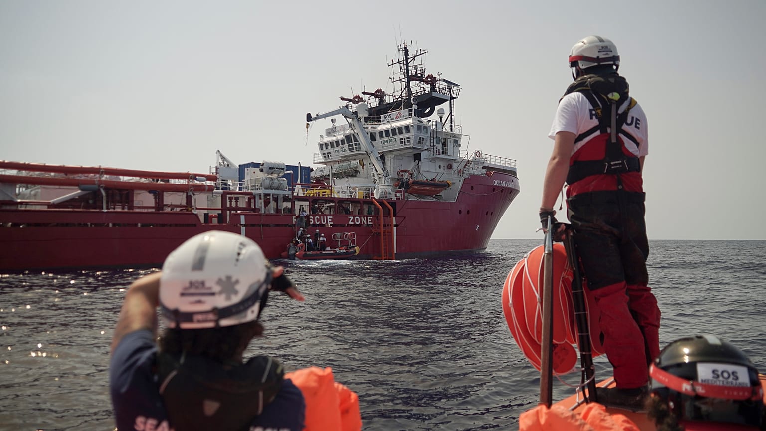 A rescuer waits for orders from the Ocean Viking in the Mediterranean Sea, Tuesday, Sept. 17, 2019. 
