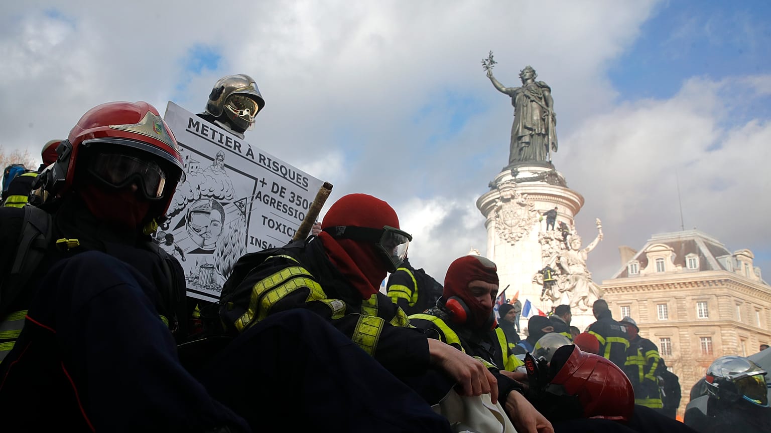 Firefighters gather for a demonstration Tuesday, Jan. 28, 2020 in Paris to demand a better pay and working conditions