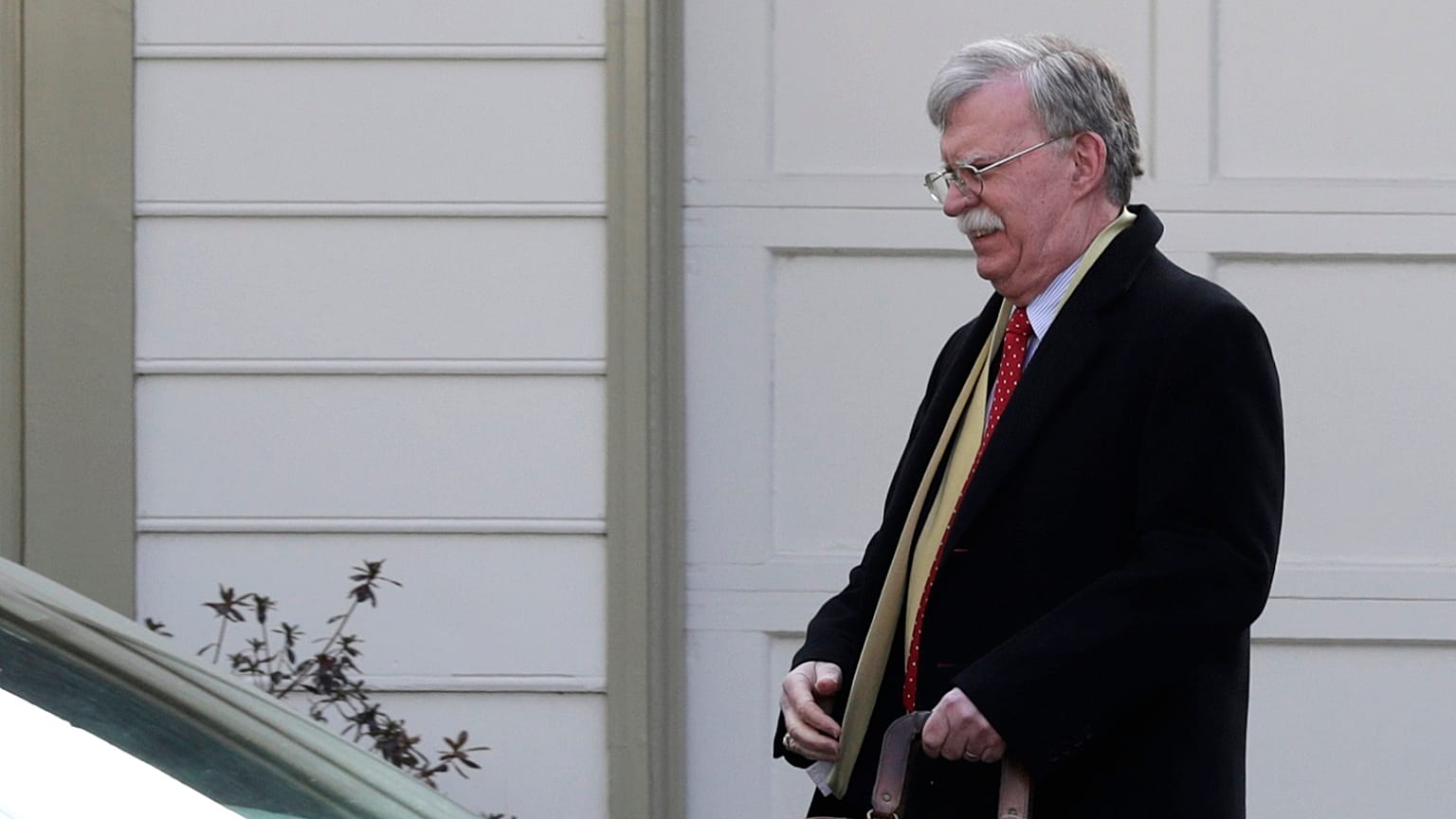 Former National security adviser John Bolton leaves his home in Bethesda, Md., Tuesday, Jan. 28, 2020.