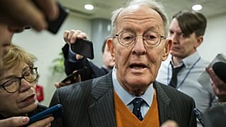 Sen. Lamar Alexander, R-Tenn., speaks to reporters as he arrives at the Capitol in Washington, Monday, Jan. 27, 2020.