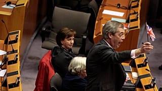 Brexit Party leader Nigel Farage waves the Union flag ahead of a vote on the UK’s withdrawal from the EU  at the European Parliament in Brussels, Wednesday, Jan. 29, 2020.  