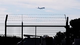 The plane carrying European passengers escaping Wuhan prepares to land at the military air base in Istres, southern France, Friday Jan.31, 2020.
