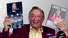 Lugner presents a photo and a book of former ski star Lindsey Vonn, 
