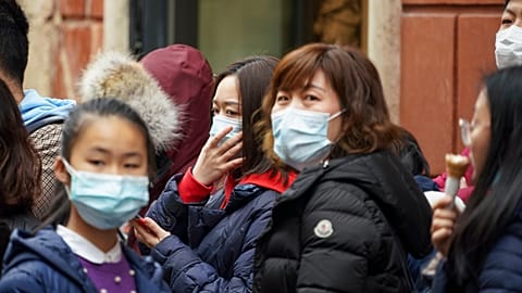 Coronavirus: Schlange stehen für Schutzmasken