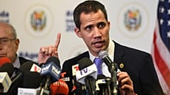 Venezuela’s interim President Juan Guaidó speaks to the media after a rally in Miami, Saturday Feb. 1, 2020. (AP Photo/Gaston De Cardenas)