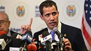 Venezuela’s interim President Juan Guaidó speaks to the media after a rally in Miami, Saturday Feb. 1, 2020. (AP Photo/Gaston De Cardenas)