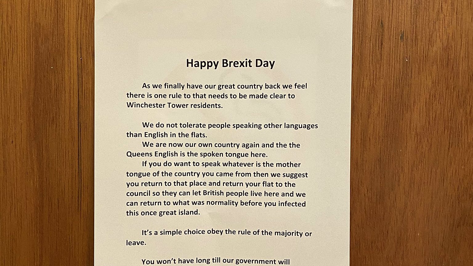 A "Happy Brexit Day" notice posted in a block of flats in Norwich, UK, has been reported to police.