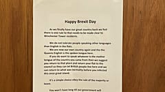 A "Happy Brexit Day" notice posted in a block of flats in Norwich, UK, has been reported to police.