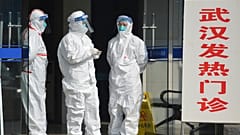 Europeans flee China as coronavirus cases continue to rise