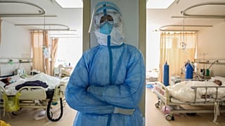 A medical staff member resting at the isolation ward of the Wuhan Red Cross Hospital in Wuhan in China's central Hubei province.