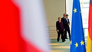 Kurz in Berlin: Merkel beharrt auf Finanztransaktionssteuer