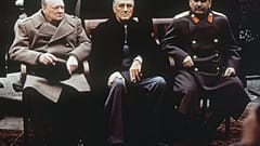 Britain's Winston Churchill (L), the US' Franklin Roosevelt (C) and Soviet leader Joseph Stalin (R) on the patio of Livadia Palace, Yalta, Crimea in February 1945.