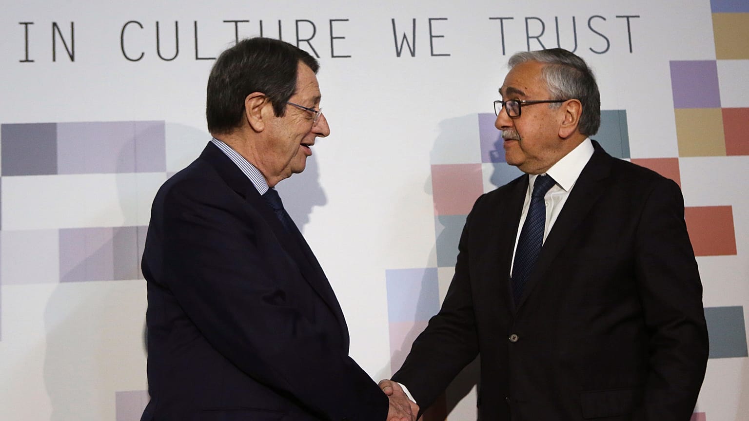 Nicos Anastasiads, left, and Mustafa Akinci