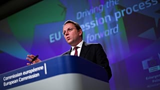 European Commissioner for Neighbourhood and Enlargement Oliver Varhelyi talks to journalists during a news conference at the European Commission headquarters in Brussels
