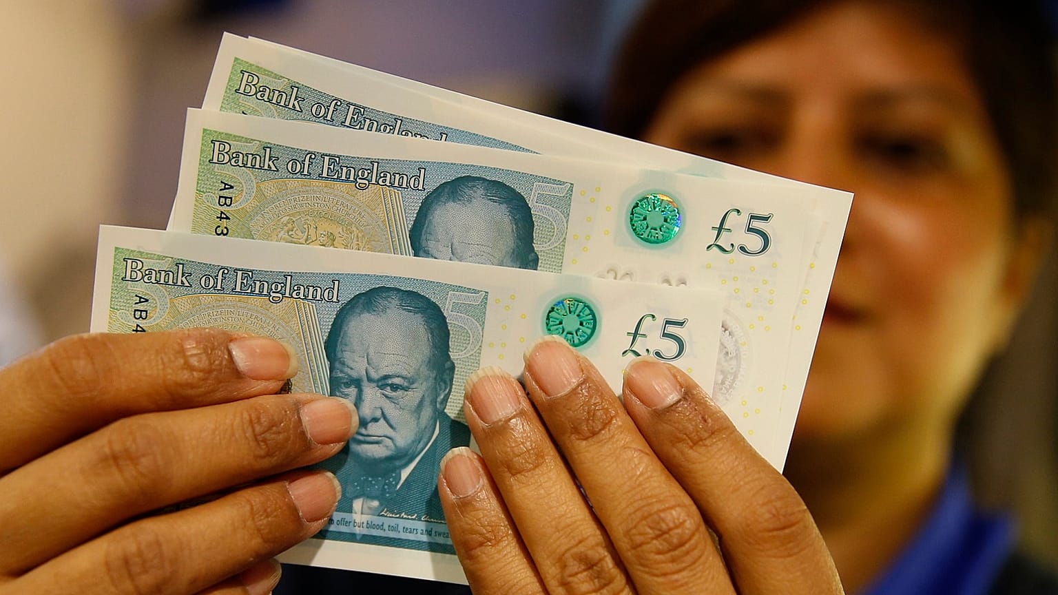 New British 5 pound sterling notes, made from polymer, which were launched Tuesday, Sept.13, 2016