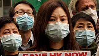 Hong Kong ile Çin arasındaki sınırın kapatılmasını talep eden Hong Konglu sağlık personeli