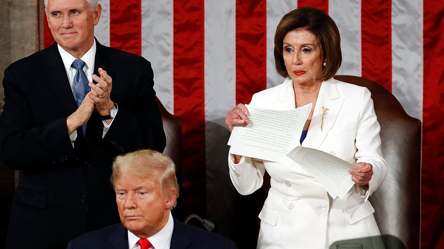 Nancy Pelosi tears her copy of President Donald Trump's s State of the Union address after he delivered it to a joint session of Congress on Capitol Hill in Washington