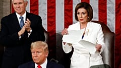 Nancy Pelosi tears her copy of President Donald Trump's s State of the Union address after he delivered it to a joint session of Congress on Capitol Hill in Washington
