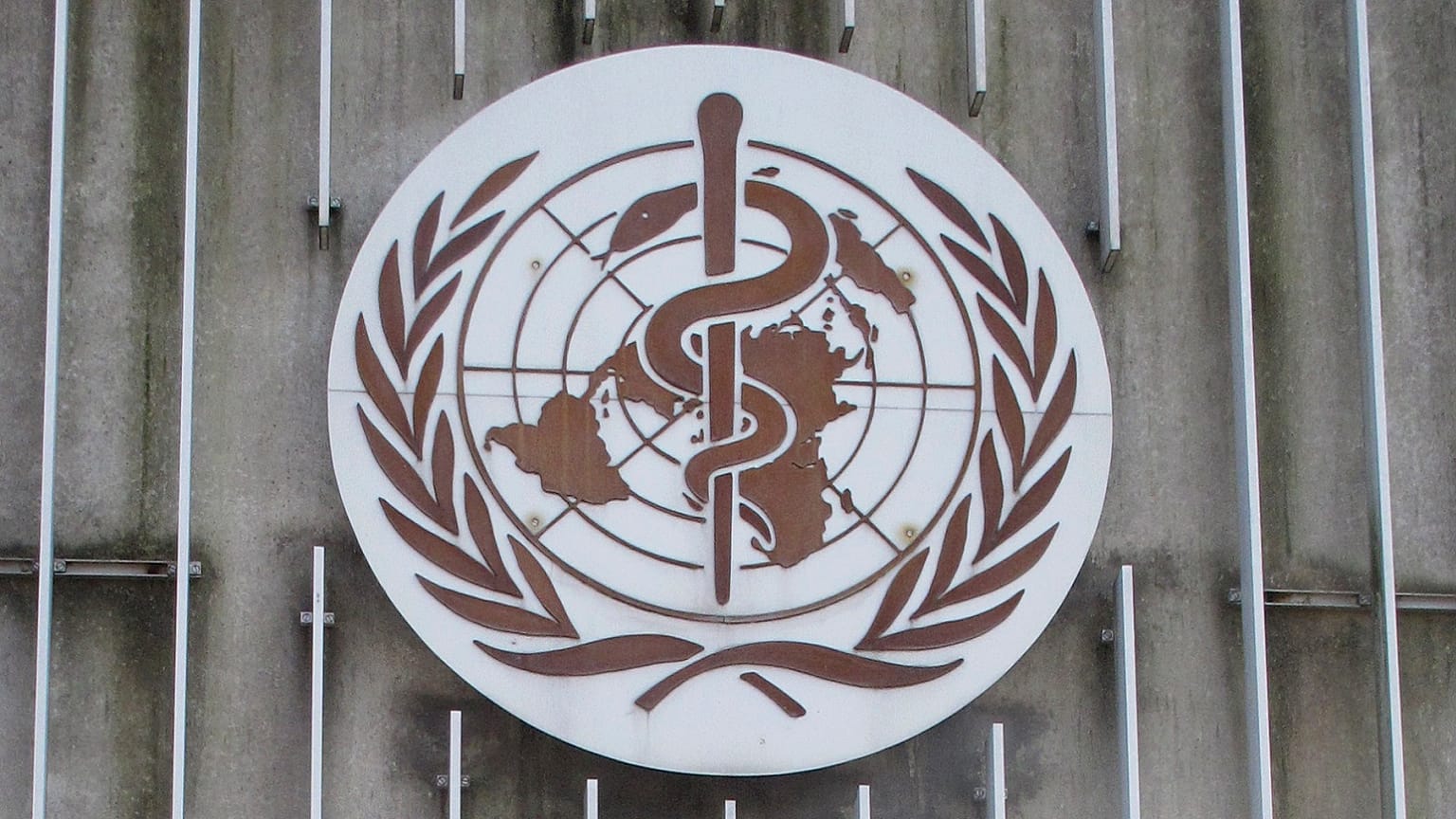The logo of the World Health Organization (WHO) at its headquarters building in Geneva, Switzerland