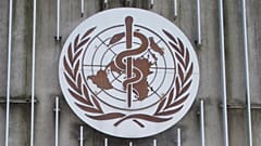 The logo of the World Health Organization (WHO) at its headquarters building in Geneva, Switzerland