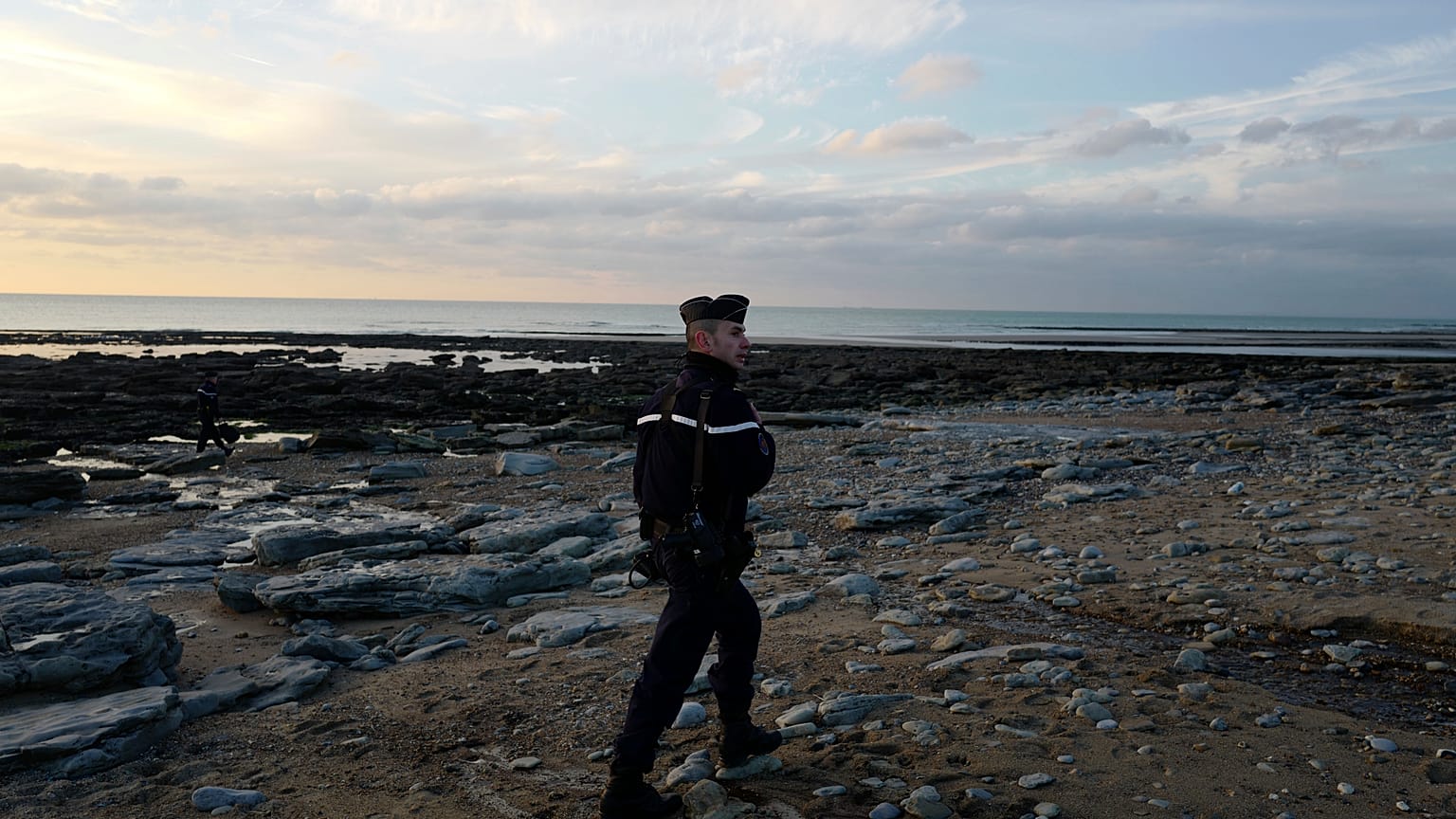 French gendarme patrols the beach in Ambleteuse near Calais, northern France.