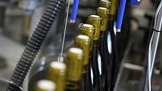 Bottles of wine are pictured in the Vinescence cellar in Saint Jean d'Ardieres, in the Beaujolais region, eastern France, in November 2019.