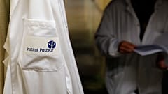 French scientists at the Pasteur Institute developed and shared a quick test for the new virus that is spreading worldwide. (AP Photo/Francois Mori