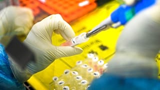 An employee works in the pop-up Huoyan Laboratory speciallized in the nucleic acid test on 2019-nCoV 
