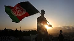 (August 19, 2019) A man waves an Afghan flag during Independence Day celebrations in Kabul, Afghanistan