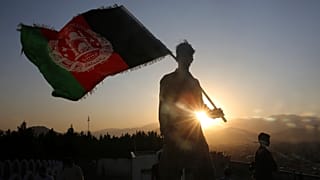 (August 19, 2019) A man waves an Afghan flag during Independence Day celebrations in Kabul, Afghanistan