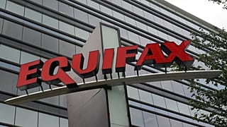 FILE- This July 21, 2012, file photo shows signage at the corporate headquarters of Equifax Inc. in Atlanta.