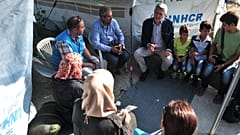 UN high commissioner for refugees Filippo Grandi speaks with Syrian refugees