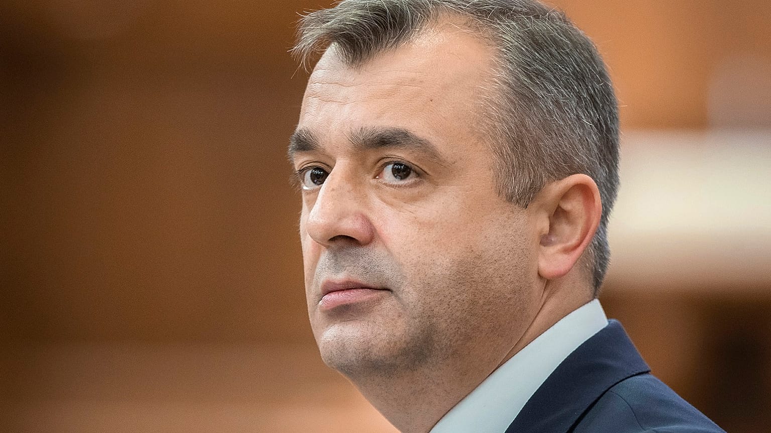 Prime Minister designate Ion Chicu, attends a parliament session in Chisinau, Moldova, Thursday, Nov. 14, 2019