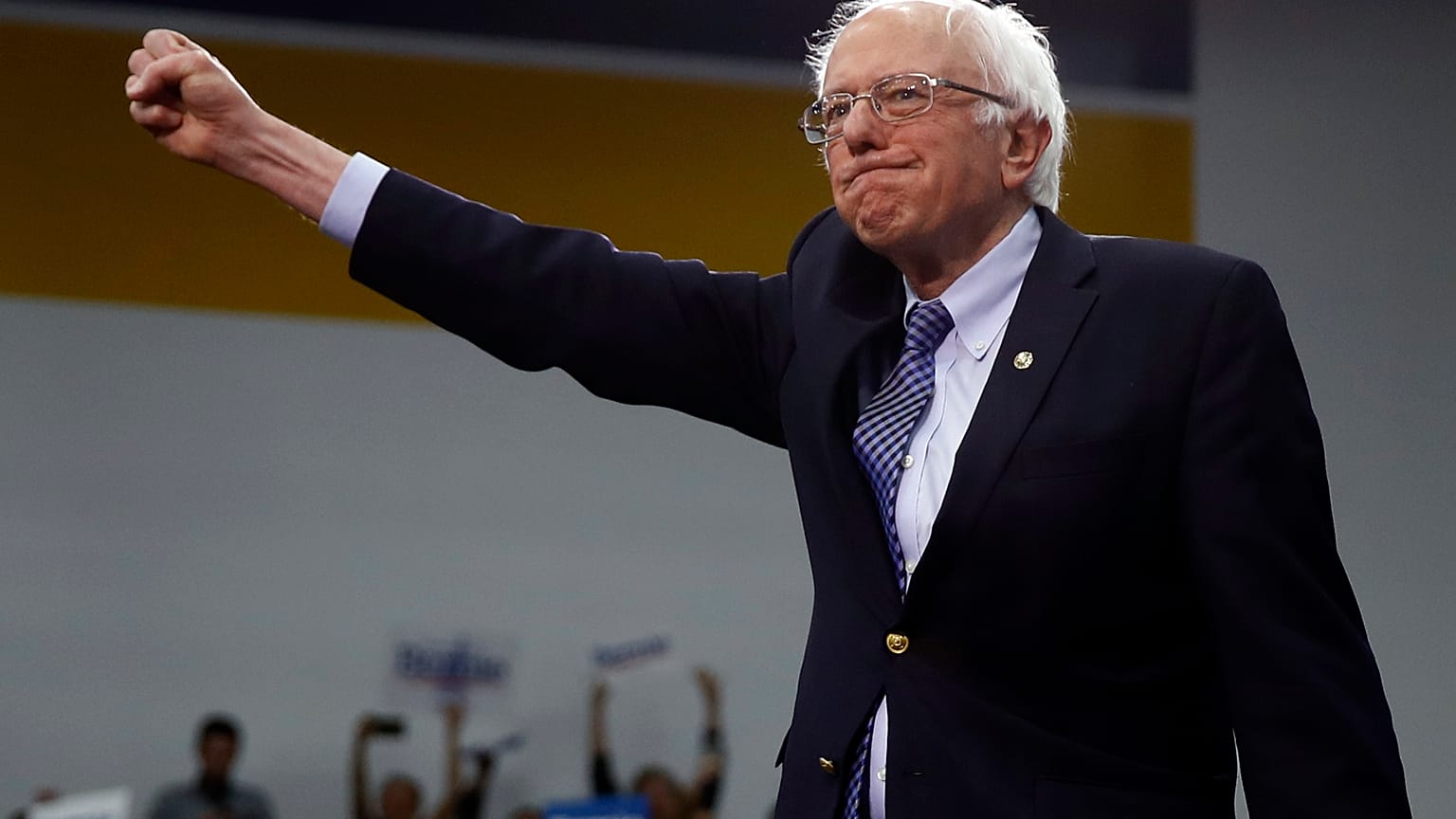Democratic presidential candidate Sen. Bernie Sanders, I-Vt., arrives to speak to supporters at a primary night election rally in Manchester, N.H.