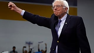 Democratic presidential candidate Sen. Bernie Sanders, I-Vt., arrives to speak to supporters at a primary night election rally in Manchester, N.H.