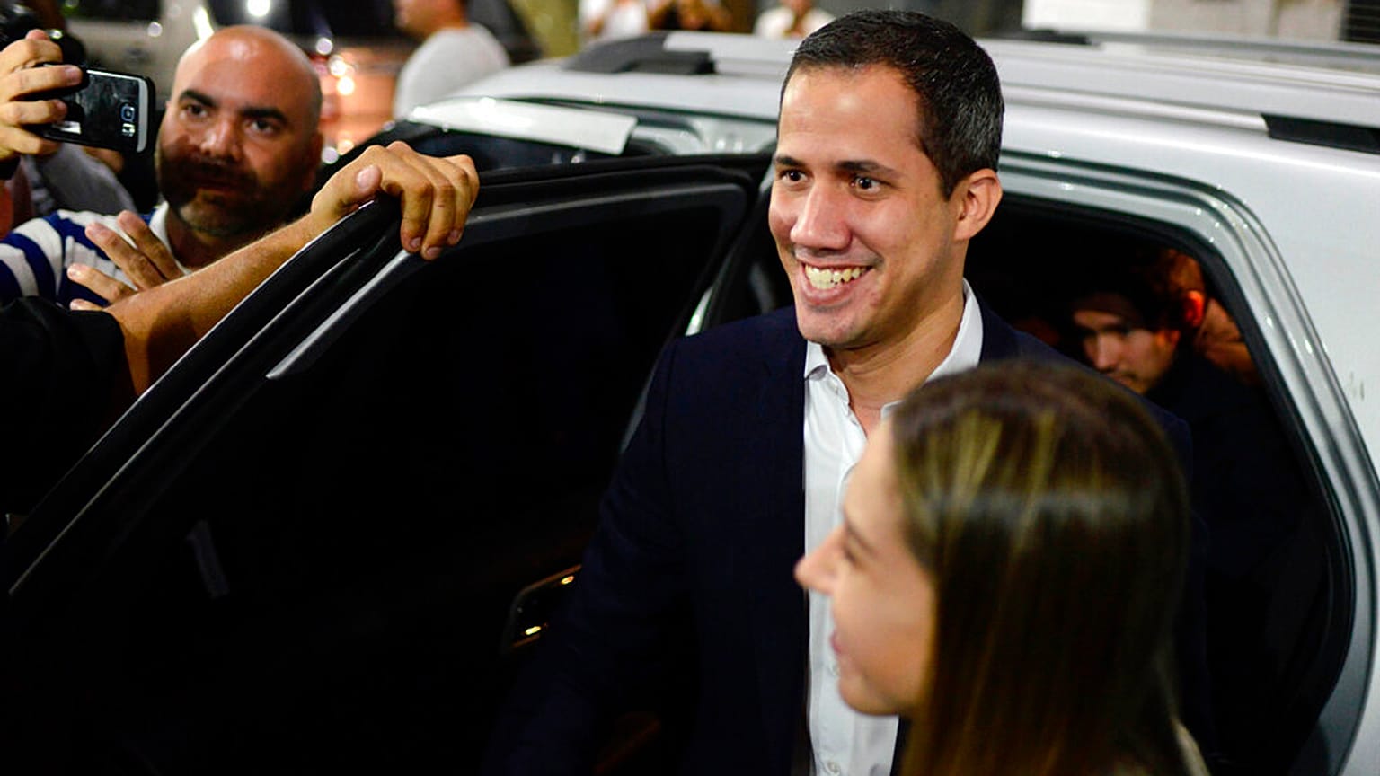 Opposition leader Juan Guaido arrives at a rally at Bolivar Plaza 